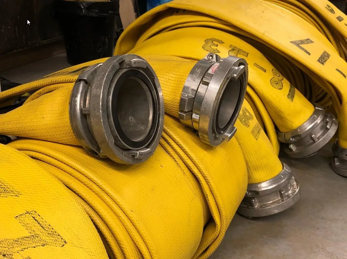 Yellow large-diameter supply hose detail